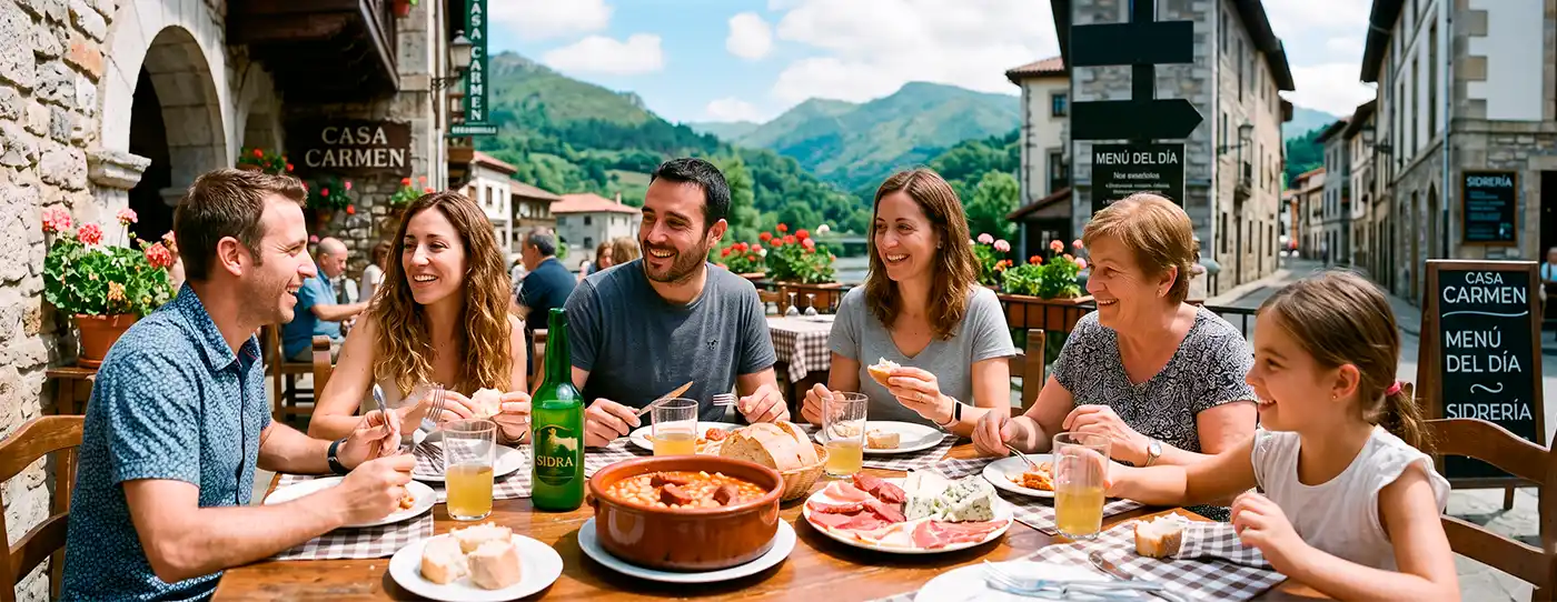 Grupo de gente comiendo en Arriondas después de hacer el descenso del Sella